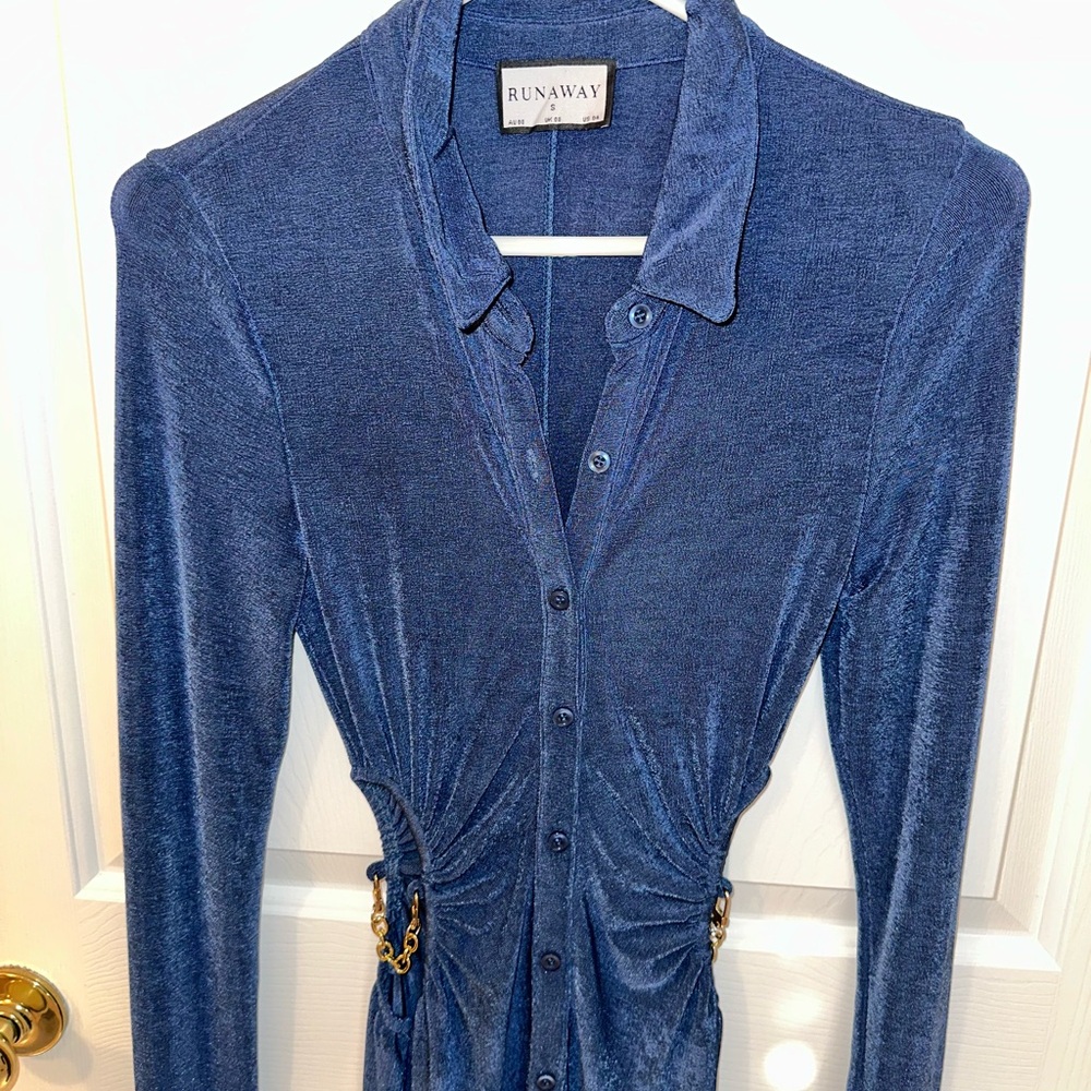 Runaway Blue Long Sleeve Dress with cutout chain sides.